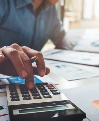 Man working with calculator